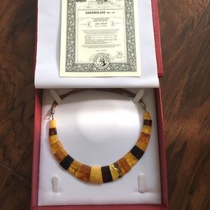 Amber necklace with certificate & leather box.